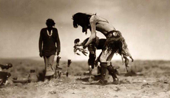 Navajo dancer performs a rain dance to combat dry conditions